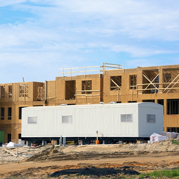 construction site office trailers typically include desks, chairs, hvac, and electrical outlets